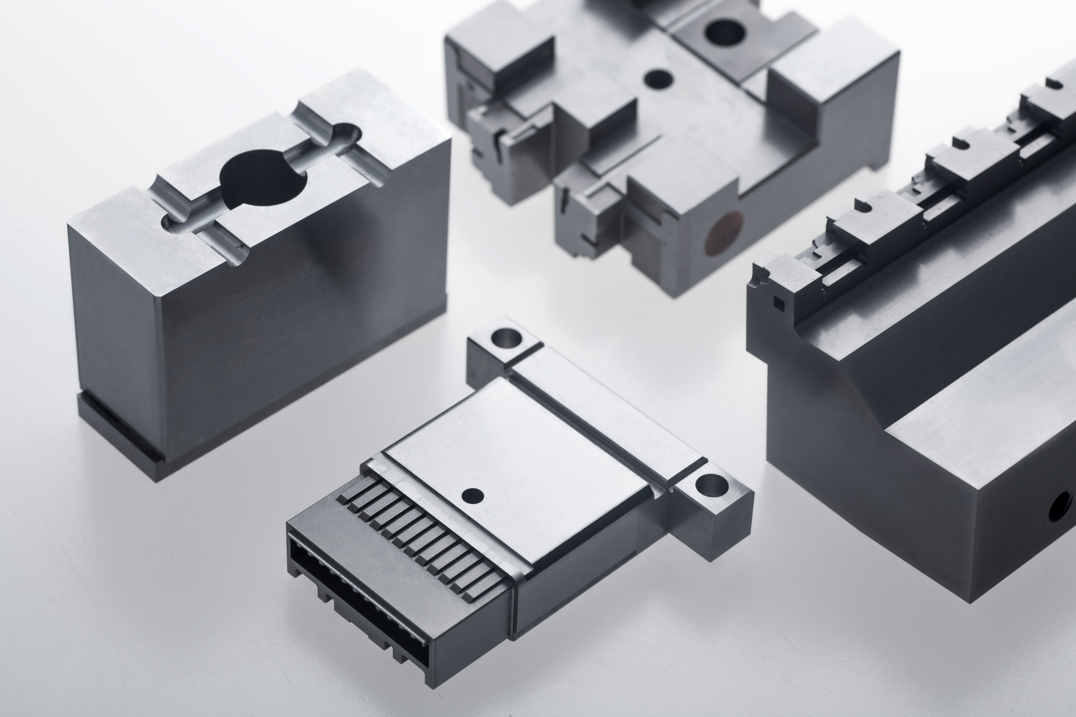 What is the role of stamping die parts in high-end machining